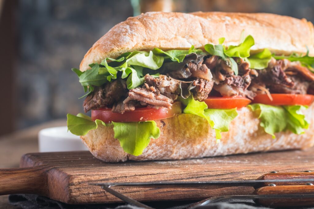 Beef sandwich with tomato and salad