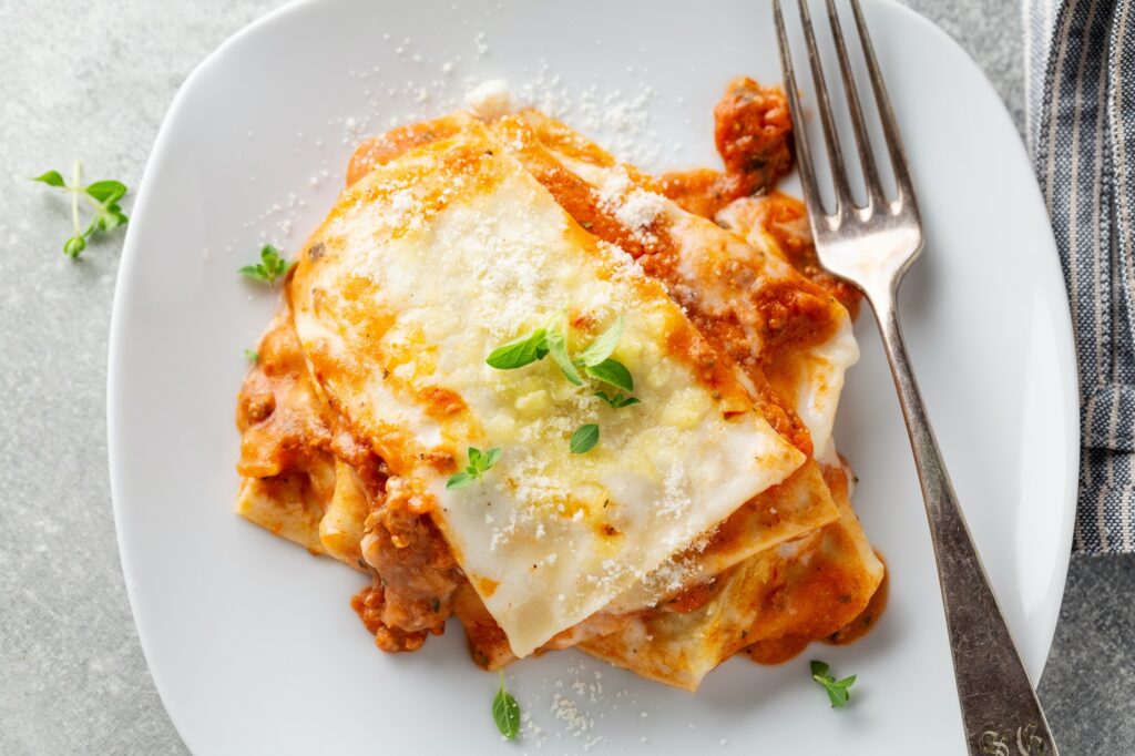 Italian lasagna with cheese served on plate